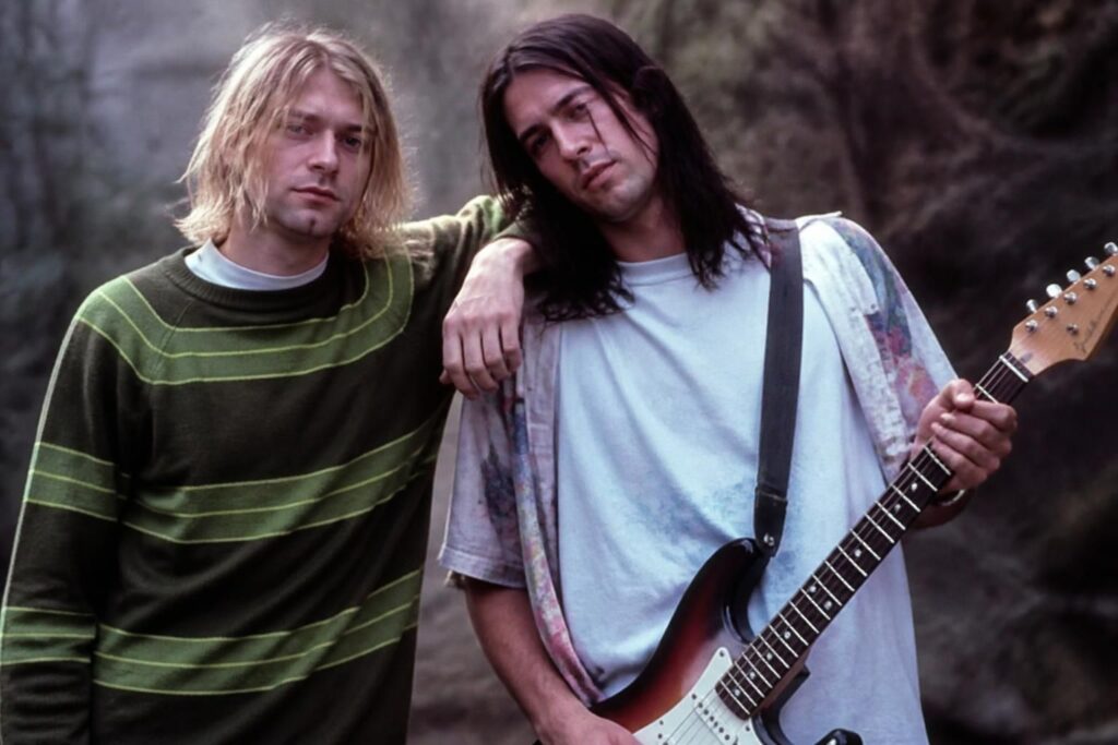 découvrez l'identité du guitariste aux côtés de kurt cobain sur la photo originale et explorez l'histoire derrière cette image emblématique.